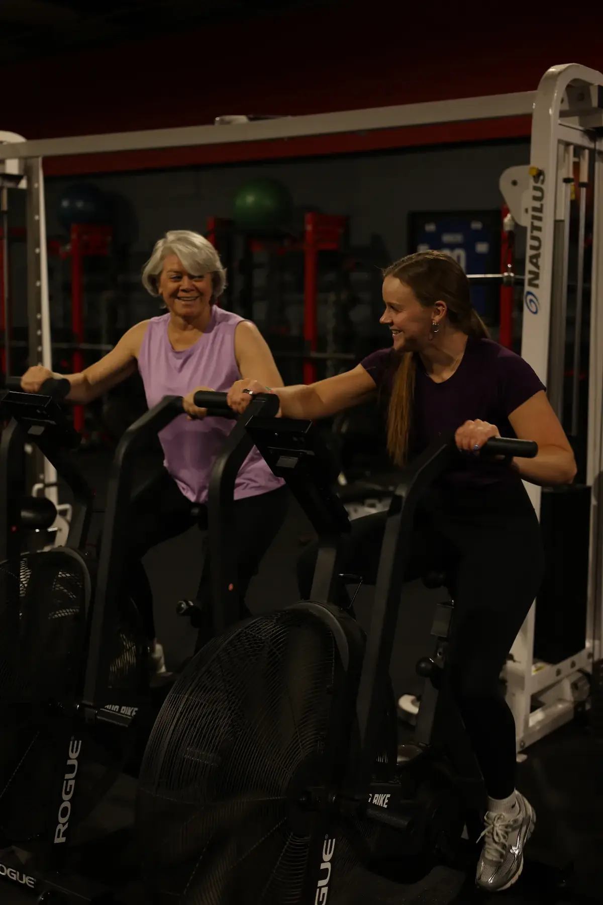 Adult client working through a coached strength session at Body Creations Inc